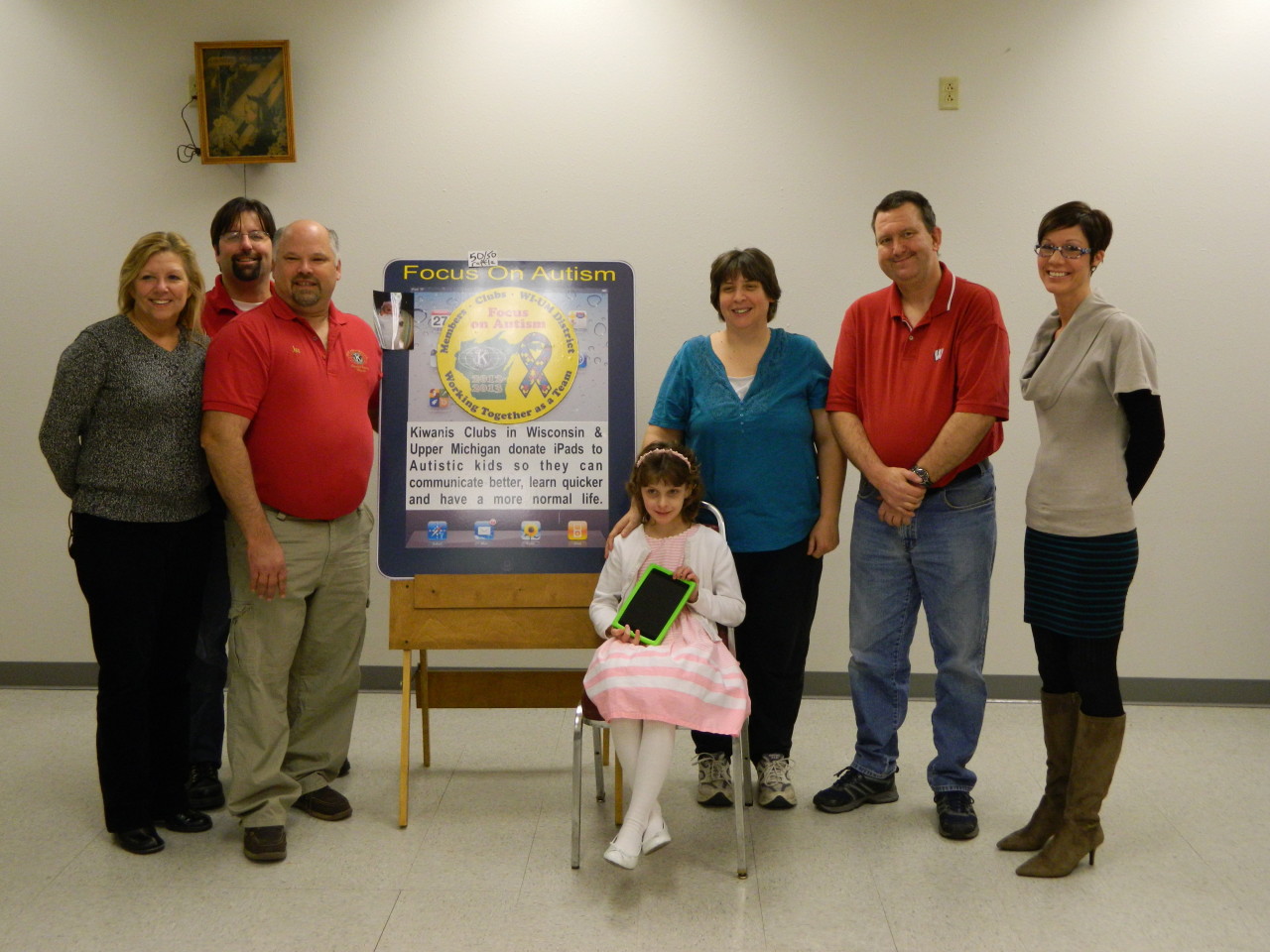 Jenna King receives iPad from members of the Kiwanis Club of Fond du Lac – Lakeside.